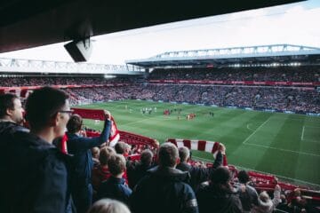fans watching a premier league football game